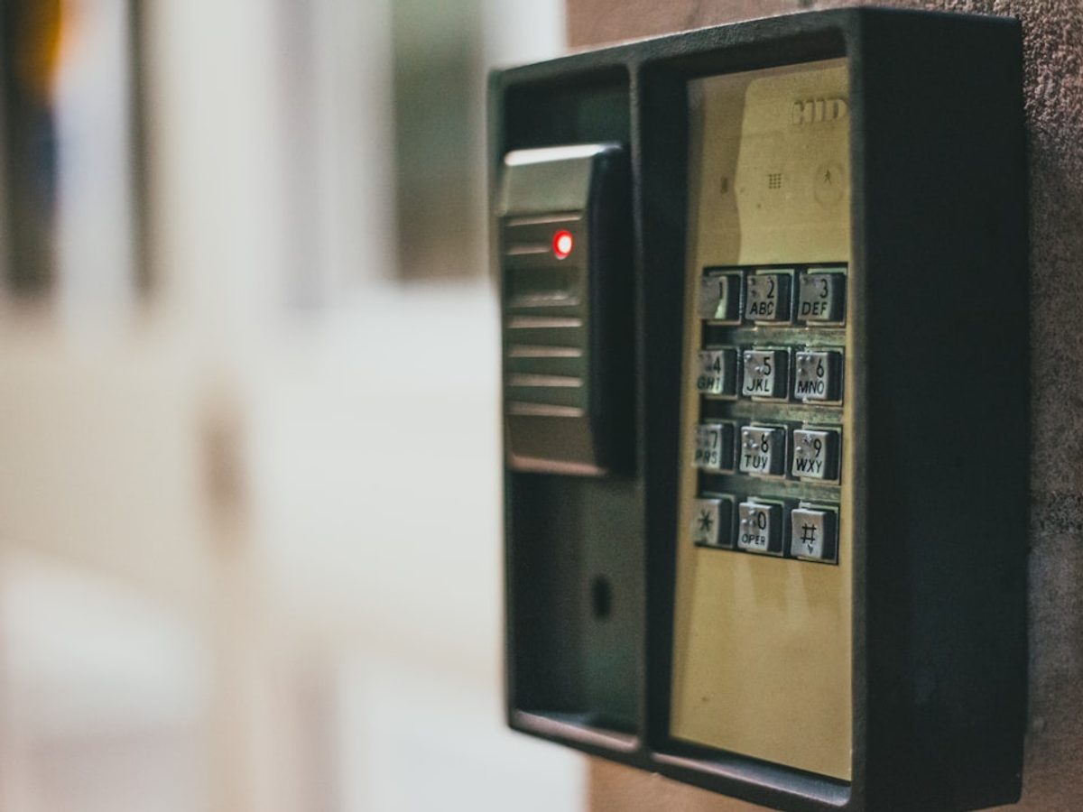 Modern access control keypad and card reader at a commercial building