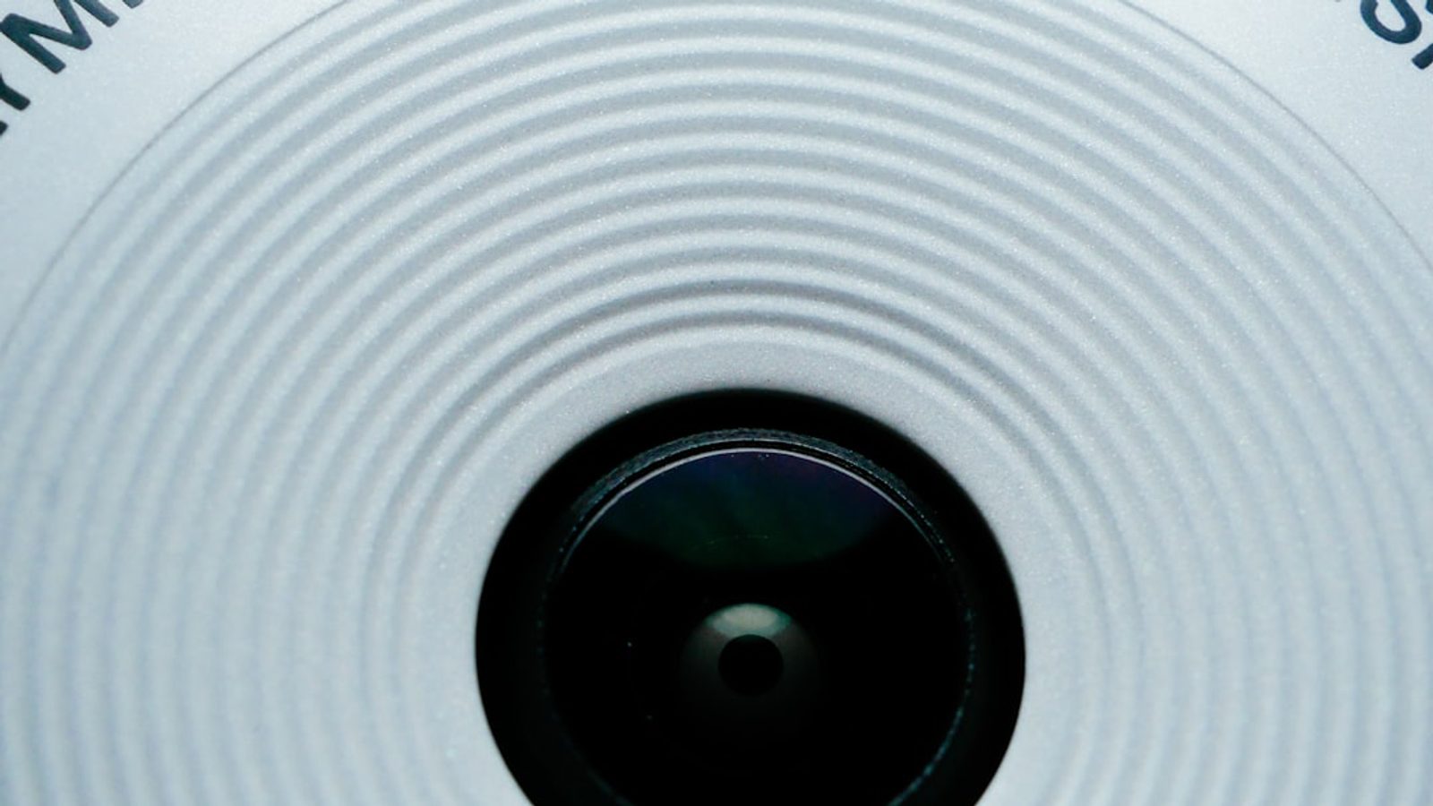 Close-up of a CCTV camera lens and housing