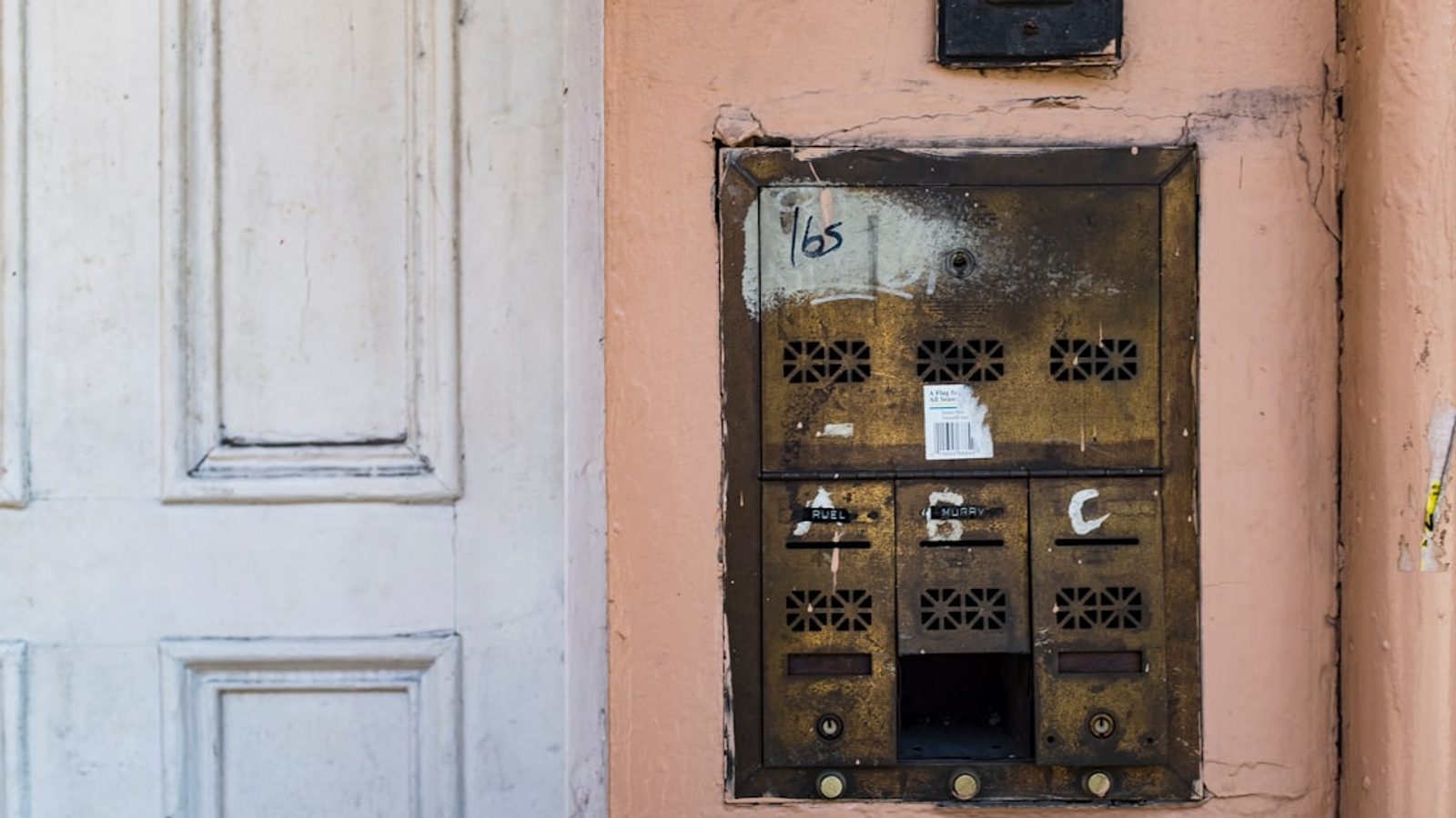 Door entry intercom panel at a building entrance